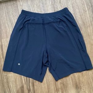 Lululemon Men Athletic shorts. Waist 28”. Lined. Navy blue. Drawstring. Pockets